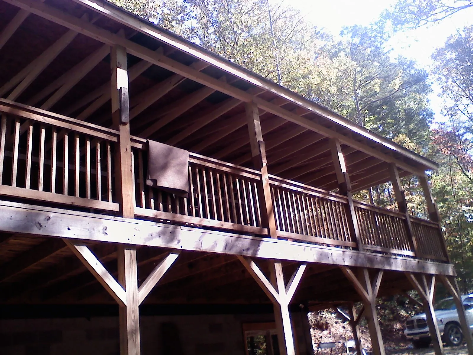 Timber framing under a new elevated porch and deck — Roof Leak Repair in Morgan by Roofing Brothers